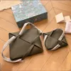 デザイナーバッグ本革ハンドバッグショルダーバケツウーマンバッグPuzl-fold-Toteクラッチトート