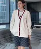 女性用カジュアルなVネックストライプホワイトセーターニットデザイナー春秋のカーディガンジャンパーセータージャケット女性のためのジャンパーセータージャケット