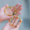 Bangle Imitatie 24 Real Gold Handstring Dames sieraden Golden vergulde ronde kralen Push en trek agaat Stone armband mode