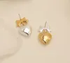 Gold and Silver DualColor Patchwork Love Shape Pendant Earrings for Women Simple Light Luxury Cold Wind 231225