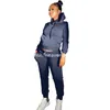 2024 Tasarımcı Polar Tracksuits Kadınlar Jogger Suits Sonbahar Kış Kış Kapşonlu Kapüşonlu Pantolon İki Parça Setleri Sıradan Katı Eşleştirmeler Siyah Spor Giyim Toptan Kıyafetleri