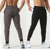 LU Women Męskie Pantle Long Pants Sport Yoga Strój Szybki suchy sznurka na siłownię Kieszenie dresowe spodnie spodnie Męskie sprężyste talia legginsy 258 258