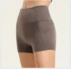 Al Women Yoga Short Running Shorts Solid Color Gril Hotty Tennis kjol Fitness Kort kjol YK080 mode