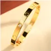 Gold Bangle rostfritt stål Skruvmejsel Par Älskar skruvarmband Mens Luxury Armband Modesmycken Valentine Day Gift för GI238H