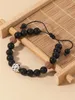 Strand Yuokiaa 8mm Smooth Black Glass Natural Stone Armband Bönbehandling Justerbar Bodhi Separation Bead Smyckespresent