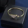 2024 TT Diamond Gold Silver Bangle Armband Womens Alloy Triangle Ingen tunt rostfritt stål armband Party Bröllop smycken för damer gåva CNS5