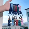 Cartoon Nordic vlinderdas gewelddadige beer PVC sleutelhanger autotas klein cadeau voor mannen en vrouwen sleutelhanger