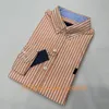 Men Shirts Casual Stripe Spring e Autumn Quality Business Dress Fashion camisetas clássicas Mens bordados decoração confortável Top Long Shirt S14