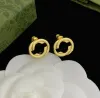 Boucles d'oreilles en argent en argent en or classique Femmes Men de charme de charme étalons de la personnalité de style simple