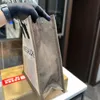 Canvas-Einkaufstasche Ledergriff Unisex Handtaschen Rive Gauche Modebretter Schnappfastener Frauen Luxus-Umhängetaschen