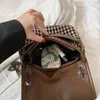 Borse da sera 2023 Autumn e inverno Houndshooth Women's Occiglia Fashion Chain Fashion Women Wool Trendy Messenger Design famoso