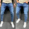 Herrenjeans, hochwertige, blaue Jeans, ausgefranst, schmal, kleiner Fuß, elastisch, Reißverschlusstasche, eng anliegende Hose