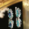 Boucles d'oreilles cerceaux vintage étincelants bleu couleur créativité x forme creux out aqua zircon zirconia joelry charmant brincos