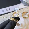 Klassiek ontwerp Weddingringen Fashion Hollow Out Spiral Diamond Ring 18K Gold Ploated Ring Designer Sieraden Accessoires Paar Love 216G