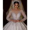 Bola Impresionante Princesa Vestidos de novia para mujeres Mangas largas Vestidos de novia turcos Sin respaldo Lentejuelas Vestido De Noiva Cristales Árabe Vestido de boda brillante