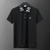 22SS TOP DESIGNER MENS POLOS Kortärmad ny vår- och sommar avslappnad skjortor Street Hip-Hop Men Casual T-shirt Tryckmönster