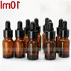 Garrafas de gotas de vidro âmbar de 10 ml por atacado para ejuice com tampo preto de borracha 10 ml e garrafa de vidro líquido boitw