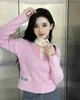 Women's Sweaters designer luxury MM Spring/Summer New Polo Collar Button Contrast Pink Age Reducing Long sleeved Top Casual Fashion Versatile Knitwear