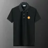 22SS TOP DESIGNER MENS POLOS Kortärmad ny vår- och sommar avslappnad skjortor Street Hip-Hop Men Casual T-shirt Tryckmönster