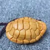 Cliff Cypress Hand Piece Rich World Hand Piece Turtle Shell Wood Carving Artifact Tea Pet Pendant Decoration Wooden Statue 231225