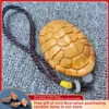 Cliff Cypress Hand Piece Rich World Hand Piece Turtle Shell Wood Carving Artifact Tea Pet Pendant Decoration Wooden Statue 231225