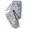 Summer Men Pants Elastyczna talia plus rozmiar 6xl spodnie dresowe luźne swobodne joggery uliczne kamuflażu 8xl 231222