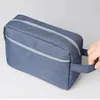 Les sacs de cosmétiques manipulent le sac de toilette de voyage de grande capacité SPage de maquillage résistant à l'eau salle de stockage de rangement léger portable