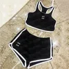 Badge metallica da bagno split bikini designer femminile brief sexy set di biancheria intima set di palestra sport sport abiti da yoga