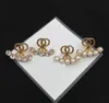 Mode kvinnor charm örhängen designer smycken ny kammad pearl dubbel bokstav sofistikerad lyxig örhänge tillbehör 22331693979911