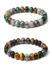 Hebras de cuentas Mezcla de piedra natural Pulseras con dijes de calavera Piedra de sangre Ojo de tigre de lava para hombres Pulsera fresca punk Brazaletes Joyería Gothi7625593