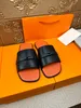 Oran Izmir Chypre Sandal Luxury Designer Leather Lady Sandals Summerフラットシューズファッションビーチメンスリッパレタードラッグスライドフリップフロップスリッパビッグサイズ38-46E