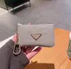 2021 novo chaveiro feminino de luxo bolsa para celular bolsa transversal feminina mini bolsa alça de ombro de corrente longa bolsa mensageiro com cordão clássico bolsa barril cintura chaveiro