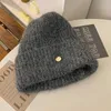 Cappello di lana da donna in autunno e inverno edizione coreana invernale grande cappone per pile a maglia sciolta sfoca