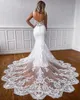 Magnifique dentelle sirène robes de mariée robe de mariée 2023 bretelles spaghetti appliques balayage train boutons couverts sur mesure grande taille robe de novia