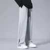Осенние расклешенные брюки с микро-расклешенными спортивными штанами Мешковатые брюки для бега из хлопка Корейские нейтральные свободные брюки для бега на открытом воздухе с индивидуальным дизайном 231222
