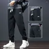 Pantaloni maschili autunno inverno kpop stile moda harajuku slim fit pantaloni sport scanghi tutti match di tasche per peluche casual badge