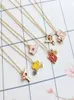 12 pièces Lot d'articles de bijoux de mode en métal émail carte Captor Sakura étoile baguette pendentif collier 5402780