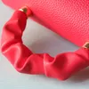 ツイストクロスボディバッグデザイナーハンドバッグ財布牛革折り畳まれた革ハンドルリムーバブルストラップゴールデンハードウェア女性フラップショルダーバッグ23cm