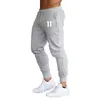 Pantalon imprimé automne Menwomen Pantalon de course joggeurs joggeurs de pantalon de survêtement pantalon décontracté gymne