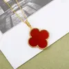 silver full diamond luxury clover designer pendant necklaces womens brand 18k gold white black flower long chain elegant winter sweater coat necklace jewelry