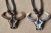 Pendentif Colliers Yak Bone Charme Vache Bull Ox Tête Crâne En Cuir Corde Collier Bijoux Accessoires Réglable1391198