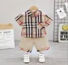 Set estivi Baby Boy Girl Tasca scozzese Camicia a maniche corte Pantaloncini scozzesi 17 anni Completo Bambini Bambini039s 2 pezzi Abbigliamento Se5769951