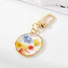 Keychains Clear Round Pressed Flat Real Dried Flower Resin Daisy Petal Pendant Metal Key Chain Rotationable Clasp Keyring Bag Holder