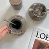 Tasses de niche de niche de style coréen tasse de café et de soucoupe ensemble rétro en acier inoxydable vlog l'après-midi petit pose exquise