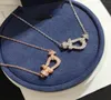 F home 925 small horseshoe buckle necklace with diamond pendant plated with 18K Rose Gold4527163