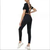 Completo da yoga nuovo stile con imbottitura sul petto T-shirt a maniche corte sul retro da donna Abito da donna nudo elastico slim fit sportivo Top fitness Drop Deli Ot5Uf