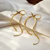 Moda cor de ouro aço inoxidável plana cobra corrente nó arco brincos para mulheres meninas bowknot longo borla brinco jóias 231226