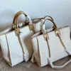 Bolsos de hombro portátiles Bolso impreso para mujer Diseñador Bolsos de playa clásicos Pochette de vaquero último estilo moda fin de semana grande Bolso de viaje para compras de playa Textura alta