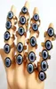 Intero 25 pz / lotto Vintage Blue Evil Eye Acciaio inossidabile Oro Anello punk Accessori donna Regalo Uomo Anello retrò partito Unique27834164561