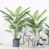 Decoratieve bloemen 1PC 65cm Kunstplanten Groen Huis Tuin Woonkamer Slaapkamer Balkon Bruiloft Decoratie Tropische Plastic Nepplant